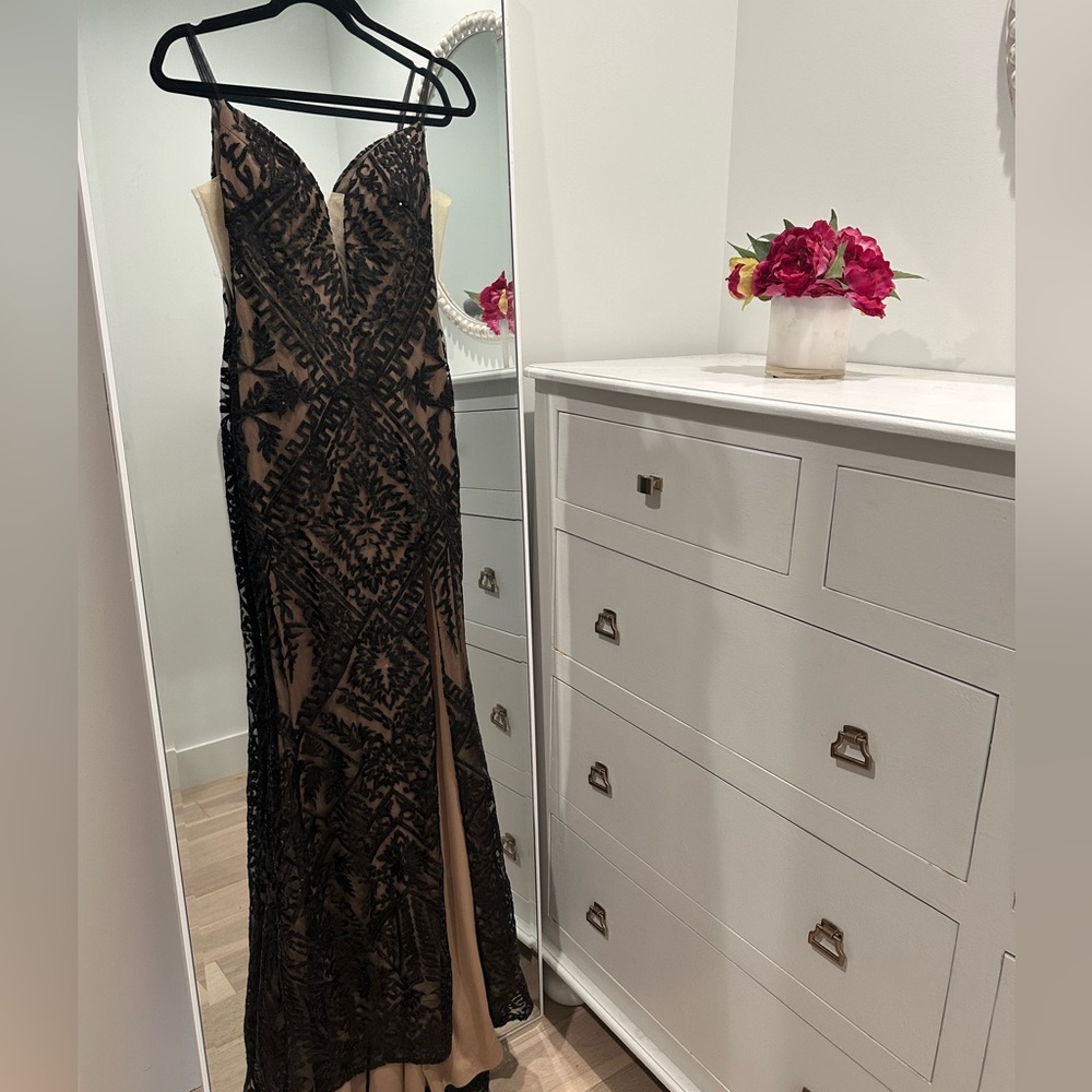 Black Designer cocktail dress with  tan sheer underlay size 00.